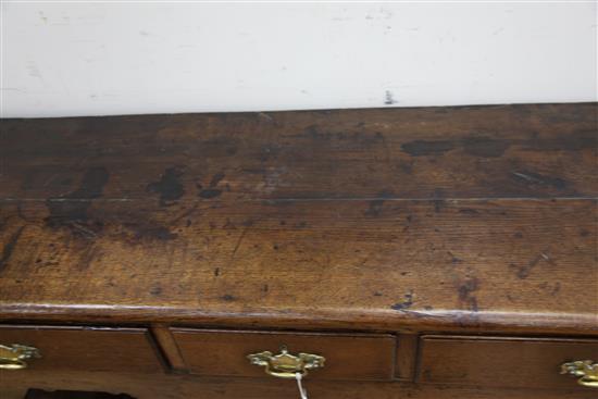 An 18th century oak dresser, W.5ft 1in. H.6ft 5in.